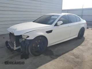 2014 BMW M5 with VIN WBSFV9C54ED097462, listed as a Copart auction lot 70482504 with 76,501 mi miles and Clean Title. Bid and sale history available at carsss.com. Image 1.