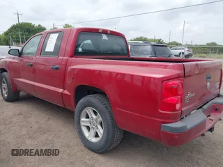 2010 Dodge Dakota with VIN 1D7CE3GP0AS166078, listed as a IAAI auction lot 41856634 with 235,615 mi miles and . Bid and sale history available at DreamBid. Image 3.