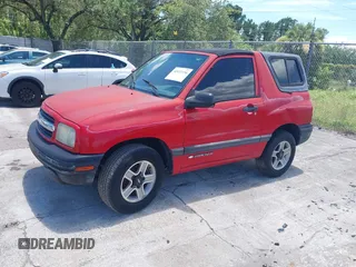 2002 Chevrolet Tracker z VIN 2CNBE18C926911755, wystawiony jako IAAI lot #42452154 z przebiegiem 129 098 mil mil oraz . Historia ofert i sprzedaży dostępna na DreamBid. Obrazek 2.