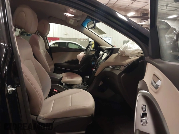 2017 Hyundai Santa Fe 2.4L with VIN 5NMZUDLBXHH041621, listed as a IAAI auction lot 42194586 with 91,012 mi miles and . Bid and sale history available at DreamBid. Image 5.