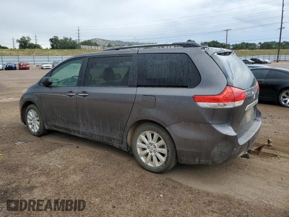 2012 Toyota Sienna XLE with VIN 5TDDK3DC6CS042627, listed as a Copart auction lot 66287715 with 161,548 mi miles and Clean title. Bid and sale history available at DreamBid. Image 2.