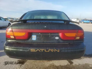 2001 Saturn SL z VIN 1G8ZK52741Z336816, wystawiony jako Copart lot #46798005 z przebiegiem 153 642 mil mil oraz Szkody całkowita. Historia ofert i sprzedaży dostępna na DreamBid. Obrazek 6.