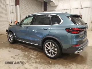 2026 BMW X5 xDrive40i z VIN 5UX23EU04T9052995, wystawiony jako Copart lot #61350465 z przebiegiem Nie podano mil oraz Czysty tytuł • Clean title. Historia ofert i sprzedaży dostępna na DreamBid. Obrazek 2.