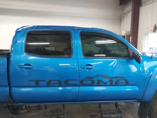 2009 Toyota Tacoma z VIN 5TEMU52N29Z656158, wystawiony jako IAAI lot #41652533 z przebiegiem 138 563 mil mil oraz . Historia ofert i sprzedaży dostępna na DreamBid. Obrazek 13.