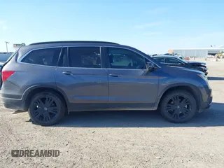 2021 Honda Pilot Special Edition with VIN 5FNYF5H27MB040801, listed as a IAAI auction lot 41656669 with 54,764 mi miles and . Bid and sale history available at DreamBid. Image 13.