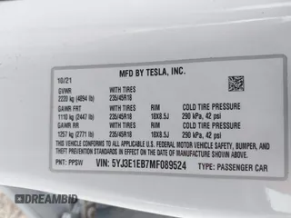 2021 Tesla Model 3 Long Range with VIN 5YJ3E1EB7MF089524, listed as a IAAI auction lot 42023474 with 19,757 mi miles and . Bid and sale history available at carsss.com. Image 9.