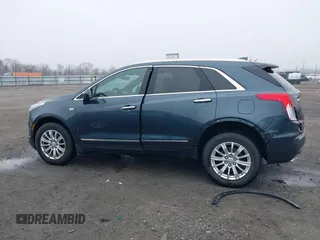 2019 Cadillac XT5 FWD with VIN 1GYKNARS5KZ220134, listed as a IAAI auction lot 41472927 with 58,229 mi miles and . Bid and sale history available at DreamBid. Image 14.