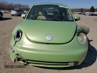 2003 Volkswagen Beetle GLS z VIN 3VWCK21C23M413421, wystawiony jako Copart lot #47252865 z przebiegiem 123 840 mil mil oraz Tytuł czysty. Historia ofert i sprzedaży dostępna na DreamBid. Obrazek 5.