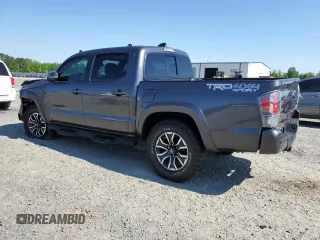2022 Toyota Tacoma SR z VIN 3TYCZ5AN8NT076536, wystawiony jako Copart lot #55268985 z przebiegiem 57 697 mil mil oraz Szkoda całkowita • Salvage title. Historia ofert i sprzedaży dostępna na DreamBid. Obrazek 2.