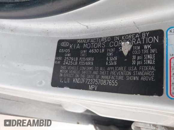 2005 Kia Sportage LX with VIN KNDJF723757087655, listed as a IAAI auction lot 41706354 with 164,736 mi miles and . Bid and sale history available at carsss.com. Image 9.