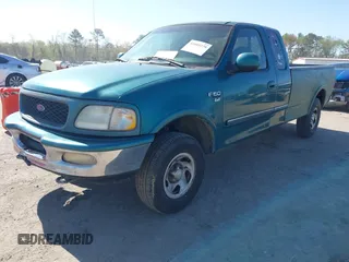 1997 Ford F-150 XL with VIN 1FTDX1861VNA45664, listed as a IAAI auction lot 42005279 with 209,847 mi miles. Bid and sale history available at carsss.com. Image 2.