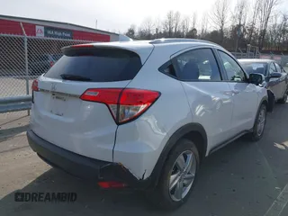 2019 Honda HR-V EX with VIN 3CZRU5H51KM726033, listed as a IAAI auction lot 41607041 with 73,220 mi miles. Bid and sale history available at carsss.com. Image 4.