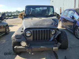 2002 Jeep Wrangler Sport with VIN 1J4FA49S72P715946, listed as a Copart auction lot 70884114 with 114,964 mi miles and Clean Title. Bid and sale history available at carsss.com. Image 5.