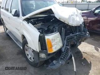 2005 Cadillac Escalade z VIN 1GYEC63N25R200026, wystawiony jako IAAI lot #41761210 z przebiegiem 226 747 mil mil oraz . Historia ofert i sprzedaży dostępna na DreamBid. Obrazek 20.