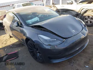 2023 Tesla Model 3 Performance with VIN 5YJ3E1EC8PF590676, listed as a IAAI auction lot 41894680 with 1 mi miles. Bid and sale history available at carsss.com. Image 1.