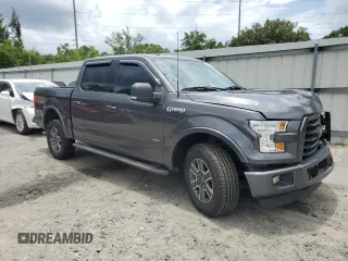 2015 Ford F-150 XLT with VIN 1FTEW1EG8FFC03207, listed as a Copart auction lot 59690515 with 261,153 mi miles and Salvage title. Bid and sale history available at DreamBid. Image 4.