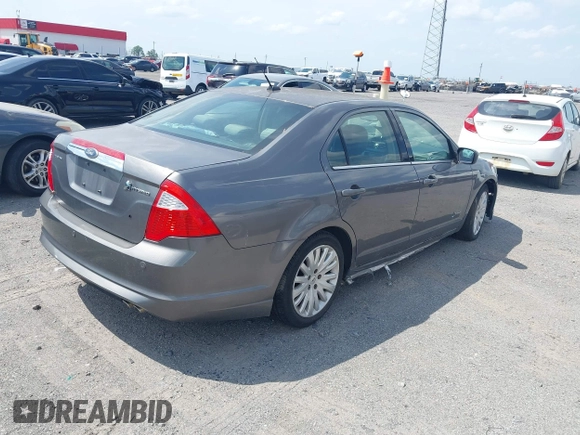 2010 Ford Fusion Hybrid with VIN 3FADP0L37AR270739, listed as a IAAI auction lot 42143035 with 238,111 mi miles. Bid and sale history available at carsss.com. Image 4.