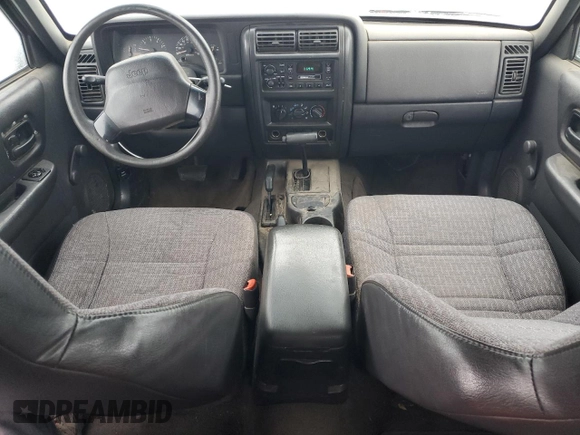 2000 Jeep Cherokee SE with VIN 1J4FF28S9YL222714, listed as a Copart auction lot 88575685 with 203,691 mi miles and Salvage Title. Bid and sale history available at carsss.com. Image 8.