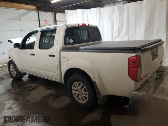 2017 Nissan Frontier SV with VIN 1N6DD0EV9HN708088, listed as a Copart auction lot 46720515 with 107,193 mi miles and Salvage title. Bid and sale history available at DreamBid. Image 2.