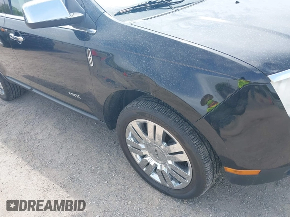 2009 Lincoln MKX with VIN 2LMDU88CX9BJ02744, listed as a IAAI auction lot 42119606 with 177,852 mi miles. Bid and sale history available at carsss.com. Image 6.