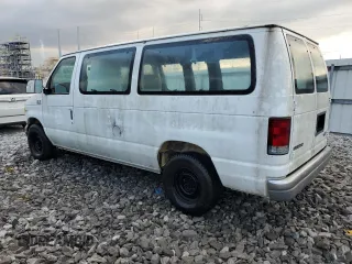 1997 Ford Econoline Wagon XL z VIN 1FMEE1163VHB75718, wystawiony jako Copart lot #71769224 z przebiegiem 79 635 mil mil oraz Szkody całkowita. Historia ofert i sprzedaży dostępna na DreamBid. Obrazek 2.
