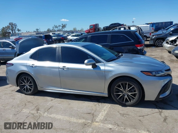 2023 Toyota Camry SE z VIN 4T1T11AK0PU833313, wystawiony jako IAAI lot #41743288 z przebiegiem 25 195 mil mil oraz . Historia ofert i sprzedaży dostępna na DreamBid. Obrazek 13.