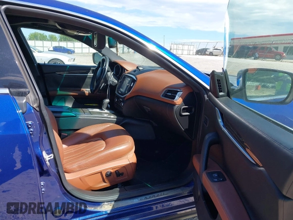 2015 Maserati Ghibli S Q4 with VIN ZAM57RTA1F1144312, listed as a IAAI auction lot 42336740 with 64,897 mi miles and . Bid and sale history available at DreamBid. Image 5.