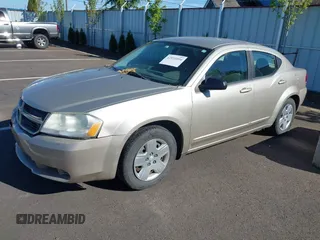 2009 Dodge Avenger SE with VIN 1B3LC46B99N559410, listed as a IAAI auction lot 42051094 with 133,272 mi miles and . Bid and sale history available at DreamBid. Image 2.