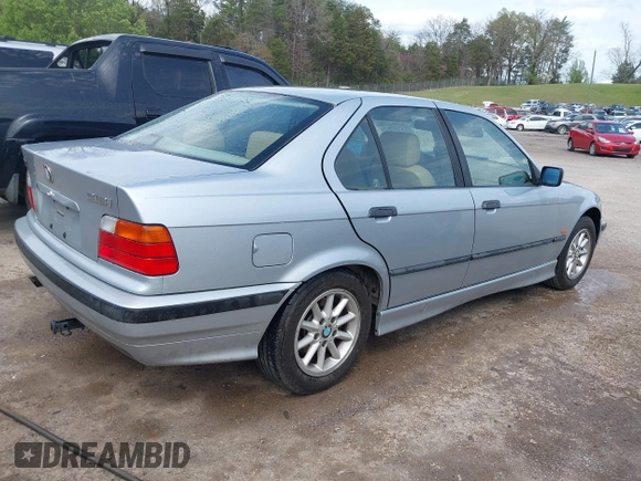 1998 BMW 3 Series 318i with VIN WBACC9322WEE60522, listed as a IAAI auction lot 41944303 with 226,799 mi miles. Bid and sale history available at carsss.com. Image 4.