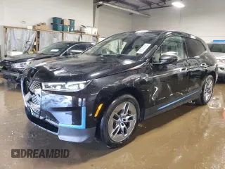 2022 BMW iX xDrive50 with VIN WB523CF08NCK62892, listed as a Copart auction lot 48244725 with 22,690 mi miles and Salvage Title. Bid and sale history available at carsss.com. Image 1.