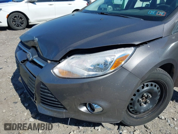 2012 Ford Focus SE with VIN 1FAHP3F27CL276208, listed as a IAAI auction lot 41995770 with 98,004 mi miles. Bid and sale history available at carsss.com. Image 12.