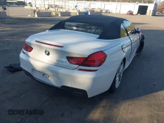 2012 BMW 6 Series 650i with VIN WBALZ3C51CDL73084, listed as a IAAI auction lot 41656473 with 61,152 mi miles and . Bid and sale history available at carsss.com. Image 4.