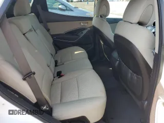2014 Hyundai Santa Fe z VIN 5XYZTDLB9EG195651, wystawiony jako Copart lot #61422625 z przebiegiem 61 128 mil mil oraz Szkoda całkowita • Salvage title. Historia ofert i sprzedaży dostępna na DreamBid. Obrazek 11.