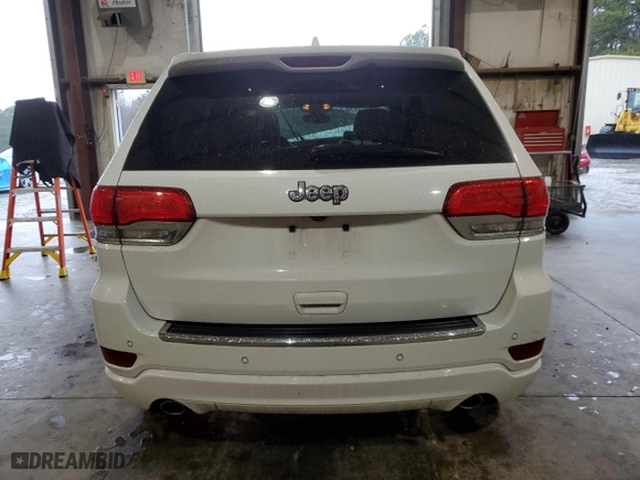 2017 Jeep Grand Cherokee Overland with VIN 1C4RJECG9HC965752, listed as a Copart auction lot 83874784 with 106,604 mi miles and Salvage Title. Bid and sale history available at carsss.com. Image 6.