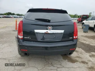 2014 Cadillac SRX Luxury Collection z VIN 3GYFNEE33ES639155, wystawiony jako Copart lot #58591935 z przebiegiem 76 368 mil mil oraz Szkoda całkowita • Salvage title. Historia ofert i sprzedaży dostępna na DreamBid. Obrazek 6.