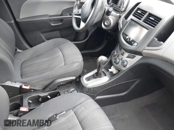 2015 Chevrolet Sonic LT with VIN 1G1JC5SH2F4105547, listed as a IAAI auction lot 42147287 with 59,073 mi miles and . Bid and sale history available at DreamBid. Image 5.