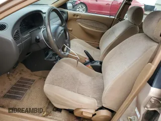 1997 Ford Escort LX with VIN 1FALP13P2VW326223, listed as a Copart auction lot 74509294 with 55,265 mi miles and Salvage Title. Bid and sale history available at carsss.com. Image 7.