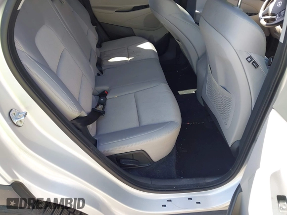 2018 Hyundai Tucson SEL with VIN KM8J3CA42JU771483, listed as a IAAI auction lot 42159936 with 91,604 mi miles and . Bid and sale history available at DreamBid. Image 8.