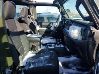 2023 Jeep Wrangler Sport Altitude with VIN 1C4HJXDN2PW569826, listed as a Copart auction lot 81825314 with 16,497 mi miles and Salvage Title. Bid and sale history available at DreamBid. Image 7.