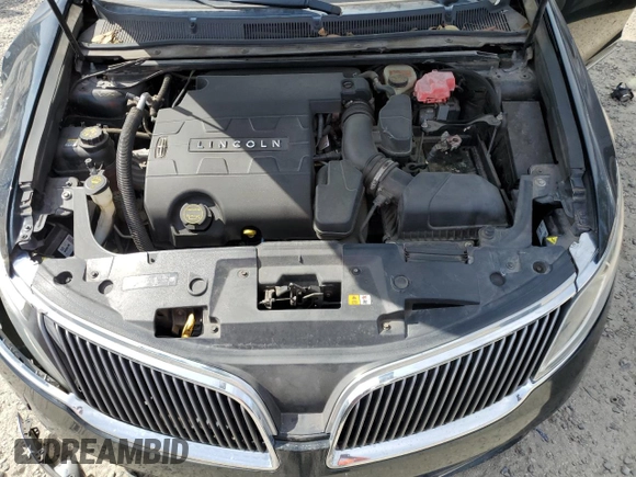 2014 Lincoln MKS с VIN 1LNHL9DK5EG609220, выставлен на аукционе Copart как лот 42928365 с пробегом Не указан миль и Списание • Salvage title. История ставок и продаж доступна на DreamBid. Изображение 13.
