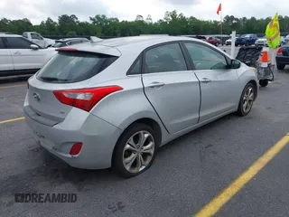 2013 Hyundai Elantra GT with VIN KMHD35LE7DU131627, listed as a IAAI auction lot 42093450 with 147,183 mi miles. Bid and sale history available at carsss.com. Image 4.