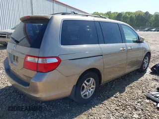2006 Honda Odyssey EX-L with VIN 5FNRL38666B410188, listed as a IAAI auction lot 42004957 with 156,584 mi miles. Bid and sale history available at carsss.com. Image 4.