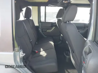 2014 Jeep Wrangler Unlimited Sport with VIN 1C4BJWDG9EL309763, listed as a IAAI auction lot 41378132 with 117,029 mi miles. Bid and sale history available at carsss.com. Image 8.