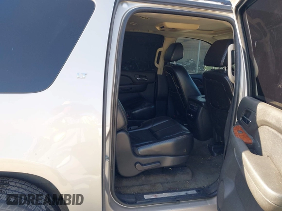 2007 Chevrolet Suburban LTZ z VIN 3GNFC16J57G103628, wystawiony jako IAAI lot #42373026 z przebiegiem 293 570 mil mil oraz . Historia ofert i sprzedaży dostępna na DreamBid. Obrazek 8.