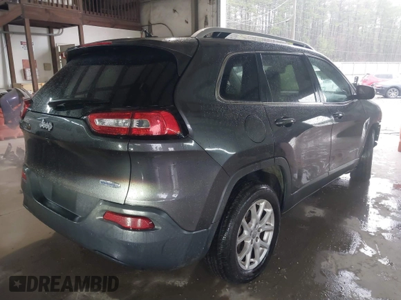 2016 Jeep Cherokee Latitude with VIN 1C4PJLCB1GW206686, listed as a IAAI auction lot 41568397 with 165,980 mi miles. Bid and sale history available at carsss.com. Image 4.