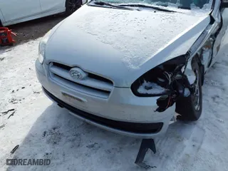 2011 Hyundai Accent GS with VIN KMHCM3AC4BU188511, listed as a IAAI auction lot 41598306 with 145,970 mi miles. Bid and sale history available at carsss.com. Image 6.