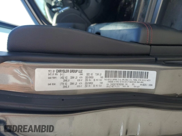 2011 Dodge Durango R/T with VIN 1D4SD6GT0BC682060, listed as a Copart auction lot 60340915 with 118,496 mi miles and Salvage title. Bid and sale history available at DreamBid. Image 13.