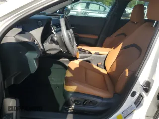 2021 Lexus UX 250h с VIN JTHP9JBH5M2041312, выставлен на аукционе Copart как лот 50294735 с пробегом 7 910 миль миль и Списание • Salvage title. История ставок и продаж доступна на DreamBid. Изображение 7.