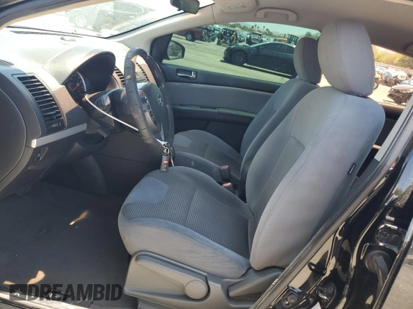 2011 Nissan Sentra S z VIN 3N1AB6AP6BL697454, wystawiony jako Copart lot #63812275 z przebiegiem 168 584 mil mil oraz Szkoda całkowita • Salvage title. Historia ofert i sprzedaży dostępna na DreamBid. Obrazek 7.