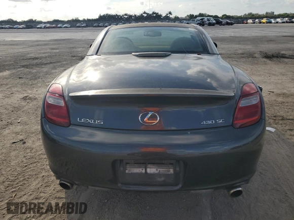 2006 Lexus SC 430 z VIN JTHFN48YX69001561, wystawiony jako Copart lot #44776165 z przebiegiem 91 337 mil mil oraz Szkoda całkowita • Salvage title. Historia ofert i sprzedaży dostępna na DreamBid. Obrazek 6.